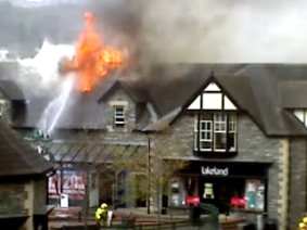Flames leap from the roof of Field and Trek